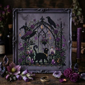 May include: Cross-stitch art featuring a black cat with a gold collar, walking in front of a gothic archway. The design includes purple roses, candles, a raven, and hanging crystals, all within a dark gray frame.