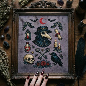 May include: A framed cross-stitch featuring a plague doctor, skull, raven, and other gothic elements. The artwork is in a wooden frame and includes a red crescent moon, bats, and keys. The color palette includes black, red, and teal.