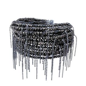 May include: A multi-layered bracelet constructed from dark metallic, faceted beads arranged in a wide, cylindrical band. Numerous long, thin strands of matching dark metallic ball chains hang vertically from the base of the beaded structure.
