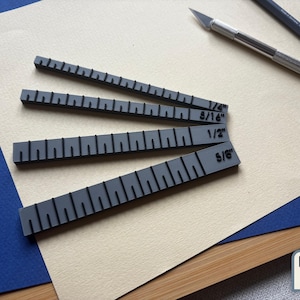 Separadores para encuadernación: Juego imperial de 4 piezas para bisagras uniformes