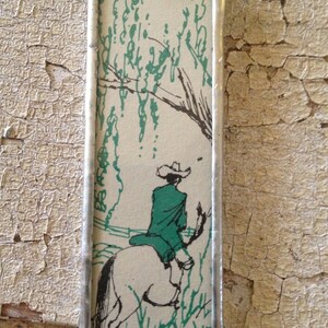 Cowboy and Horse pendant (double sided) made from vintage books