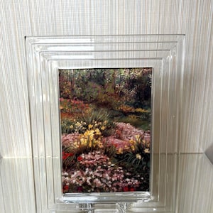 May include: A set of three ceramic mugs with a speckled, matte finish. The mugs are in shades of cream, light gray, and dark gray. Each mug has a simple, minimalist design, perfect for coffee or tea.