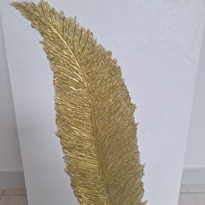 Gold feather