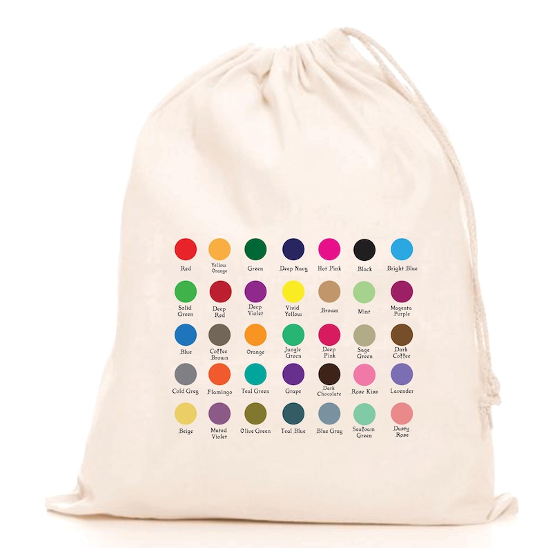 May include: A cream-coloured drawstring bag displaying a colour chart. The chart presents a grid of coloured circles, each labelled with a colour name, such as red, blue, green, and various other shades.