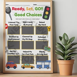 May include: A framed chart with the text "Ready, Set, GO!! Good Choices" and illustrations of a key, traffic light, and vehicles. The chart has spaces to mark safe choices, including "Listened The First Time" and "Didn't Honk At Anyone."