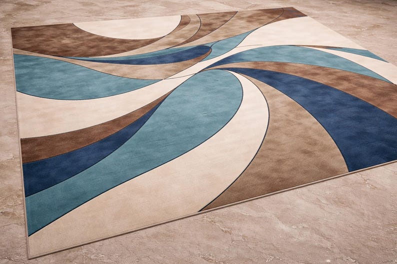 May include: A rectangular area rug with a modern design. The rug features curved patterns in shades of brown, blue, and cream. The rug's design creates a sense of movement and visual interest, suitable for a living room or bedroom.
