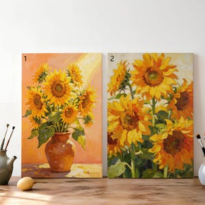 May include: Two rectangular canvas paintings labeled 1 and 2. Painting 1 shows a bouquet of yellow sunflowers in a brown vase against an orange background. Painting 2 depicts a cluster of yellow sunflowers with green leaves on a light background.