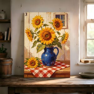 May include: A canvas painting featuring a vibrant bouquet of yellow sunflowers in a glossy blue ceramic pitcher. The pitcher sits on a red and white checkered cloth against a rustic white wooden wall with a small window. The number 3 is visible.