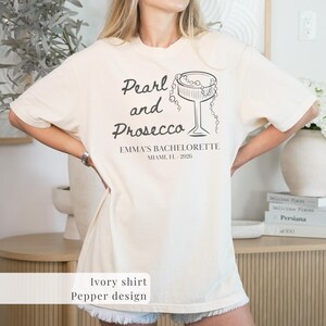Maglietta "Perla e Prosecco Comfort Colors", ideale per addio al nubilato e brunch nuziale.