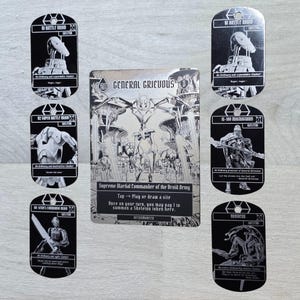 May include: A central rectangular game card featuring General Grievous surrounded by six black metal dog tags. Each tag displays a Star Wars droid character, including B1 Battle Droids, a B2 Super Battle Droid, an IG-100 MagnaGuard, and a Droideka.