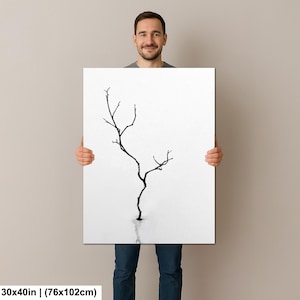May include: A black and white art print featuring a minimalist tree silhouette against a white background. The artwork measures 30x40 inches.