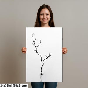 May include: A black and white art print featuring a minimalist illustration of a bare tree branch. The artwork is displayed on a white background and measures 24x36 inches.