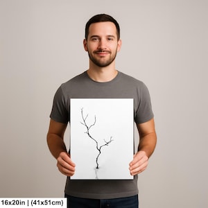 May include: A black and white art print featuring a minimalist tree branch design. The artwork is displayed on a white background and measures 16x20 inches.