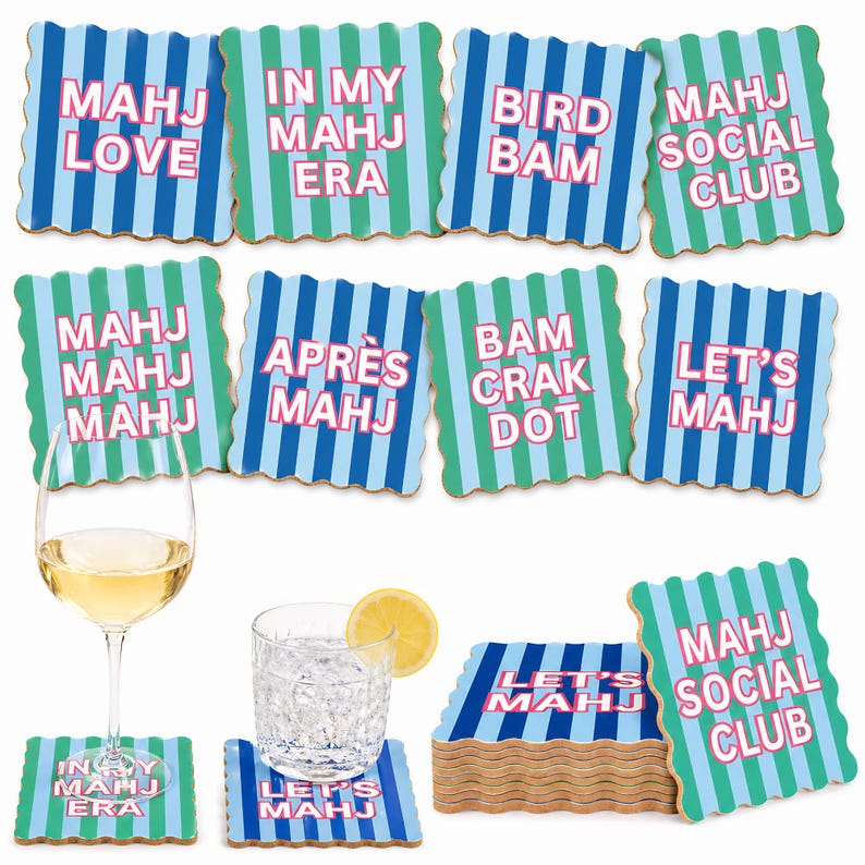 May include: A set of square coasters with scalloped edges, featuring vertical blue and green stripes and pink text. Phrases include MAHJ LOVE, IN MY MAHJ ERA, BIRD BAM, MAHJ SOCIAL CLUB, MAHJ MAHJ MAHJ, APR&Egrave;S MAHJ, BAM CRAK DOT, and LET'S MAHJ.