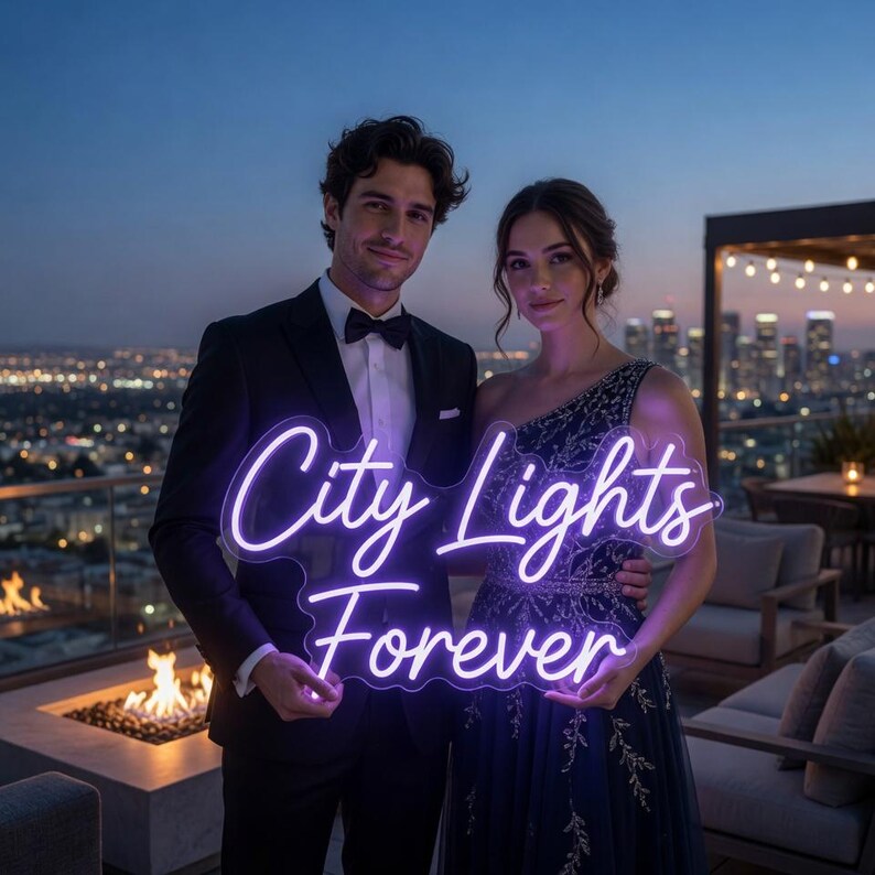 May include: A custom neon sign featuring the text City Lights Forever in a bright purple script font. The sign is mounted on a clear acrylic backing and emits a vibrant glow, displaying the words in two lines against a dark evening backdrop.