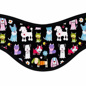 May include: Black underwear featuring a repeating pattern of colorful cartoon dogs in various breeds and colors, including white, blue, pink, and green, interspersed with small white and yellow flowers and tiny pink hearts, finished with a black trim.
