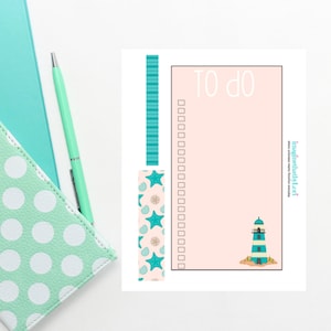 May include: A printable to-do list with a beach theme. The list has a light pink background with a lighthouse and seashells. The text "To do" is at the top of the list. There are 12 checkboxes on the list.