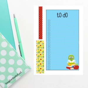 May include: A blue and white checklist with the words "to do" at the top. There are 15 blank checkboxes. A green turtle with a red apple and a stack of books is in the bottom right corner. There are two patterned strips on the left side of the checklist.
