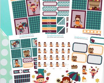 May include: A set of printable fall-themed planner stickers featuring a girl with an umbrella, a basket of leaves, and a pumpkin. The stickers are in shades of teal, brown, orange, and white.