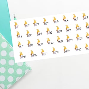 May include: Thirty yellow and brown gnome stickers with numbers 1 through 30. The gnomes are wearing yellow hats and holding a small brown bear.