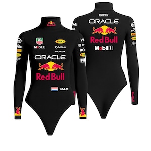May include: Black long-sleeved bodysuit featuring Red Bull and Oracle logos, with additional sponsor branding. The bodysuit has a turtleneck collar and a form-fitting design. The Dutch flag is also visible on the front.