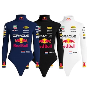 May include: Three long-sleeved bodysuits in navy blue, black, and white. Each features a turtleneck collar and the Red Bull logo, along with sponsor logos like Oracle and Honda. The Dutch flag is displayed below the word "MAX".