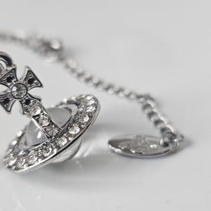 collier vintage Saturne orbe