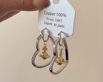 Saturn Herz Ohrringe.