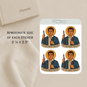 May include: A sheet of stickers featuring an illustration of St. Pier Giorgio Frassati. Each sticker is approximately 2 1/4 x 2.5 inches and depicts a man in a blue plaid shirt holding a cross and a staff, with the text "ST. PIER GIORGIO FRASSATI".