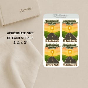 May include: A sheet of stickers with the text "The Eucharist is the Highway to Heaven" and "St. Carlo Acutis". Each sticker is approximately 2 1/4 x 3 inches. The design features a road leading to a sun.