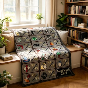 May include: A grey fleece blanket featuring a grid of pixelated skill icons, each marked with the number 99. The design includes various symbols like a fist, shield, bow, wizard hat, and skull. The bottom right corner displays the text Total level: 2277.