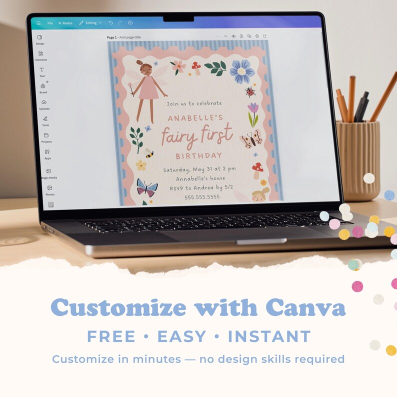 May include: A laptop displays a fairy-themed birthday invitation with a pink and blue border. The invitation features a fairy illustration, floral accents, and the text "Anabelle's fairy first birthday." The screen also shows the text "Customize with Canva."