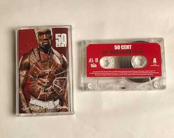 May include: Two cassette tapes. The first features a red and black cover with a photo of 50 Cent and the text "50 Cent" and "Get Rich Or Die Tryin". The second tape has a red label with "50 Cent" and "Get Rich Or Die Tryin" printed on it.