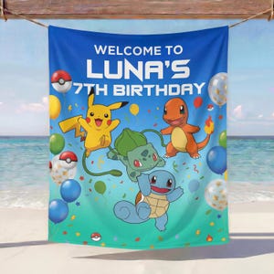 May include: A blue beach towel with the text "WELCOME TO LUNA'S 7TH BIRTHDAY" and cartoon characters. The towel features Pikachu, Charmander, Bulbasaur, and Squirtle, along with balloons and Pokeball designs.