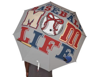 Paraguas plegable con diseño de jugador de béisbol y lluvia