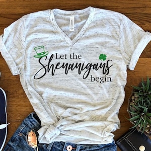 Let The Shenanigans Begin Clover Shamrock St Patrick's Day Fun Unisex V Neck Graphic Tee T-Shirt