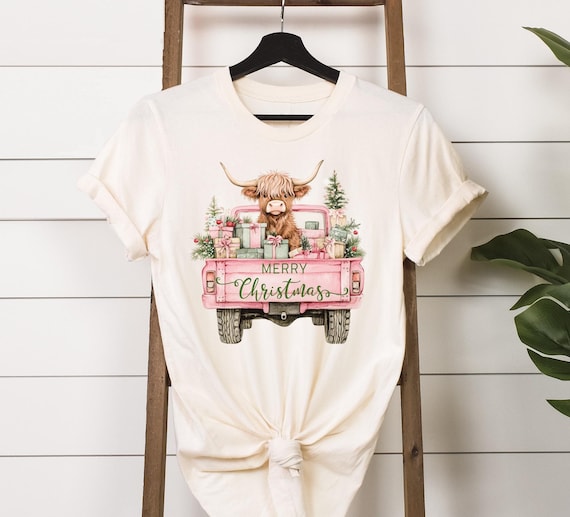 Pink Highland Cow Christmas Shirt, Girly Fluffy Cow In Truck Christmas Sweatshirt or Tee