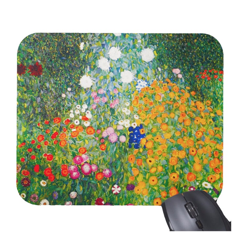 May include: A colourful mouse mat featuring a painting of a garden with a variety of flowers in shades of red, orange, yellow, pink, white, and blue.
