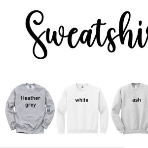 a white sweater with the words sweatshirt on it