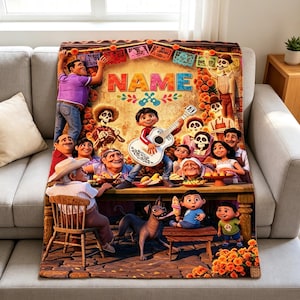 May include: A rectangular fleece blanket featuring a colorful graphic print of characters from the movie Coco, including a boy playing a white guitar, various family members, and a dog. The word NAME is printed in large, bold, multi-colored letters.