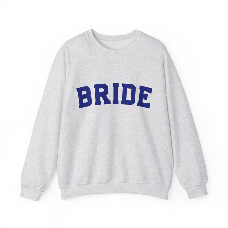 Bride Crewneck Bridal Sweatshirt Engaged gift for her custom mrs shirt announce engagement personalized wifey get married custom engaged shirt bride getting ready outfit future mrs engaged just engaged gift just married shirt bride hoodie mrs hoodie wifey sweatshirt bride mrs sweatshirt. bride clothes, wedding newly engaged gift. This is a custom bride crewneck bridal sweatshirt. It's a gildan 18000 crewneck sweatshirt.