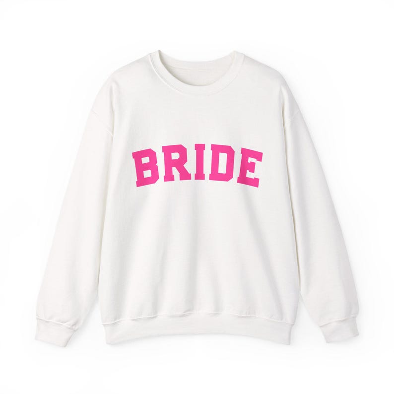 Bride Crewneck Bridal Sweatshirt Engaged gift for her custom mrs shirt announce engagement personalized wifey get married custom engaged shirt bride getting ready outfit future mrs engaged just engaged gift just married shirt bride hoodie mrs hoodie wifey sweatshirt bride mrs sweatshirt. bride clothes, wedding newly engaged gift. This is a custom bride crewneck bridal sweatshirt. It's a gildan 18000 crewneck sweatshirt.