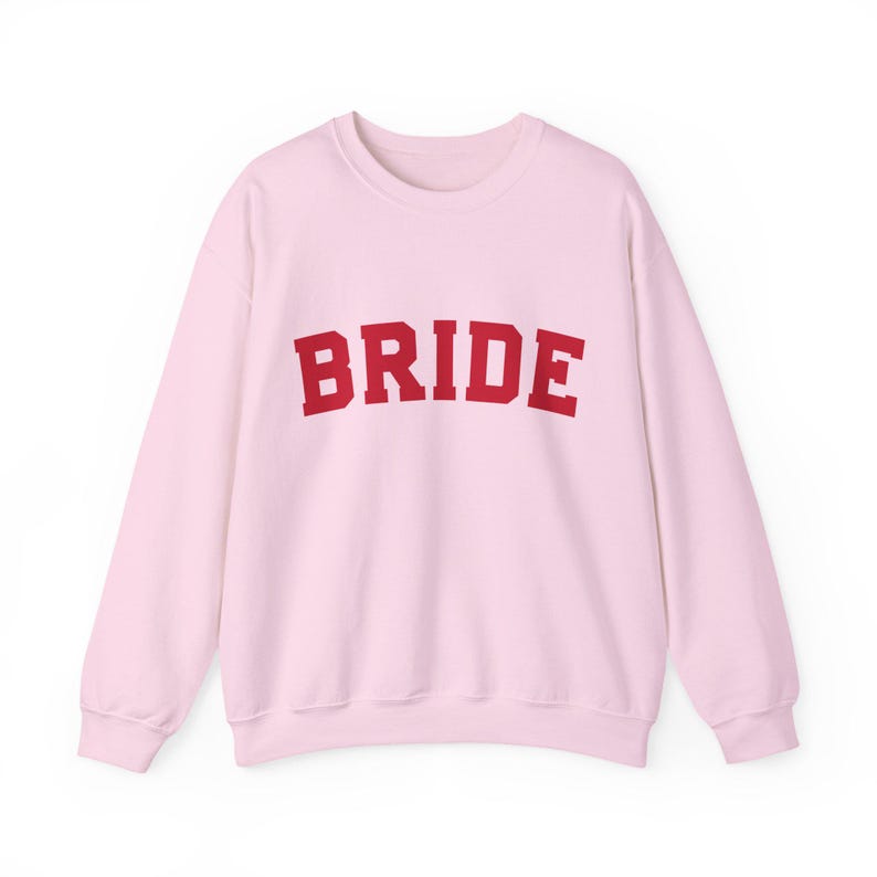 Bride Crewneck Bridal Sweatshirt Engaged gift for her custom mrs shirt announce engagement personalized wifey get married custom engaged shirt bride getting ready outfit future mrs engaged just engaged gift just married shirt bride hoodie mrs hoodie wifey sweatshirt bride mrs sweatshirt. bride clothes, wedding newly engaged gift. This is a custom bride crewneck bridal sweatshirt. It's a gildan 18000 crewneck sweatshirt.