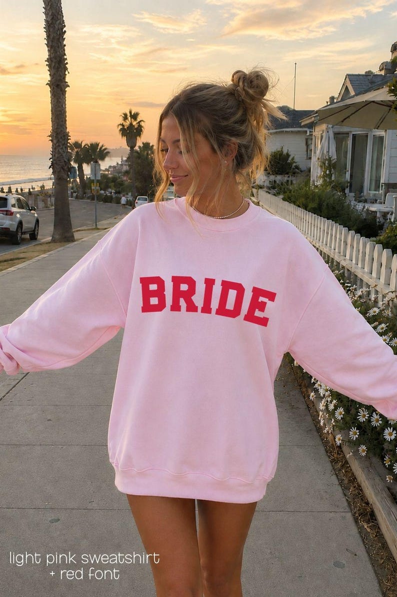 Bride Crewneck Bridal Sweatshirt Engaged gift for her custom mrs shirt announce engagement personalized wifey get married custom engaged shirt bride getting ready outfit future mrs engaged just engaged gift just married shirt bride hoodie mrs hoodie wifey sweatshirt bride mrs sweatshirt. bride clothes, wedding newly engaged gift. This is a custom bride crewneck bridal sweatshirt. It's a gildan 18000 crewneck sweatshirt.