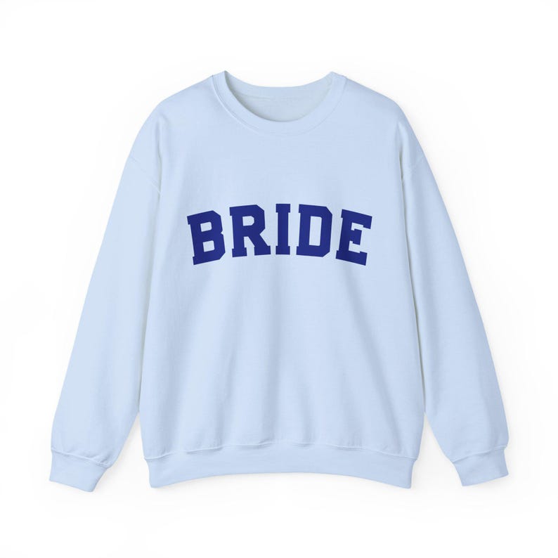 Bride Crewneck Bridal Sweatshirt Engaged gift for her custom mrs shirt announce engagement personalized wifey get married custom engaged shirt bride getting ready outfit future mrs engaged just engaged gift just married shirt bride hoodie mrs hoodie wifey sweatshirt bride mrs sweatshirt. bride clothes, wedding newly engaged gift. This is a custom bride crewneck bridal sweatshirt. It's a gildan 18000 crewneck sweatshirt.