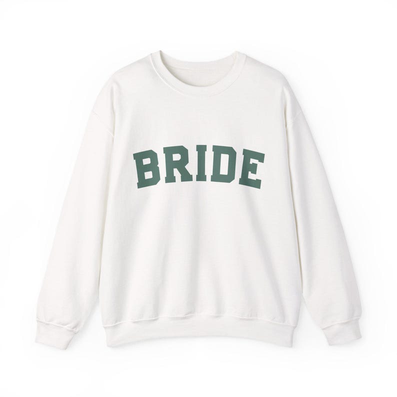 Bride Crewneck Bridal Sweatshirt Engaged gift for her custom mrs shirt announce engagement personalized wifey get married custom engaged shirt bride getting ready outfit future mrs engaged just engaged gift just married shirt bride hoodie mrs hoodie wifey sweatshirt bride mrs sweatshirt. bride clothes, wedding newly engaged gift. This is a custom bride crewneck bridal sweatshirt. It's a gildan 18000 crewneck sweatshirt.