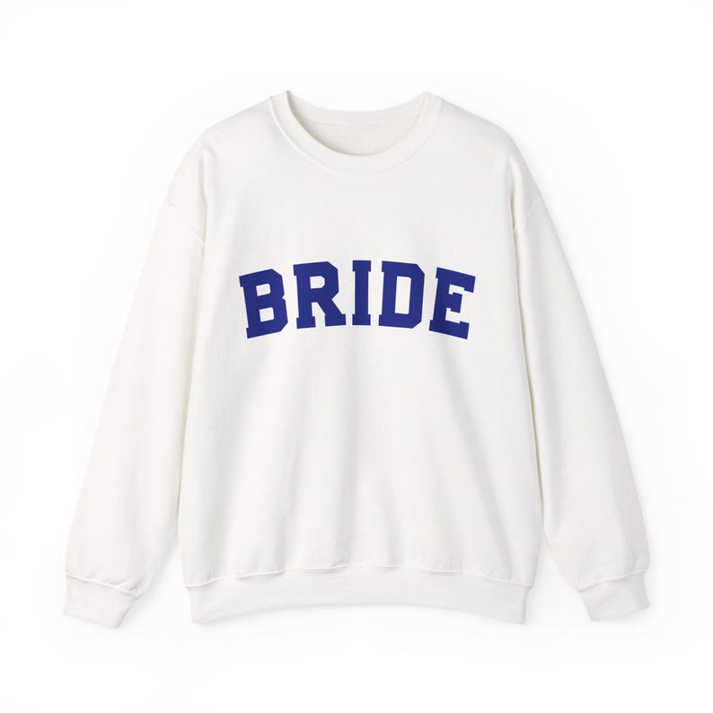 Bride Crewneck Bridal Sweatshirt Engaged gift for her custom mrs shirt announce engagement personalized wifey get married custom engaged shirt bride getting ready outfit future mrs engaged just engaged gift just married shirt bride hoodie mrs hoodie wifey sweatshirt bride mrs sweatshirt. bride clothes, wedding newly engaged gift. This is a custom bride crewneck bridal sweatshirt. It's a gildan 18000 crewneck sweatshirt.
