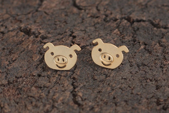 Gold pig best sale earrings