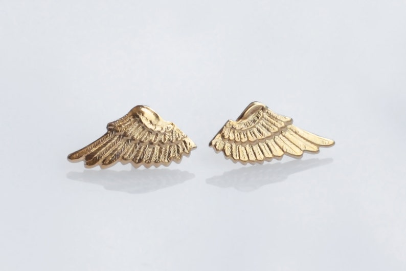half wing gold earrings half wing gold earrings