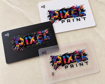 May include: Three rectangular cards featuring the text PIXEL PRINT in a colorful, pixelated font with paint splatter accents. One card is white, one is black, and one is transparent, showing an internal copper antenna coil and chip.